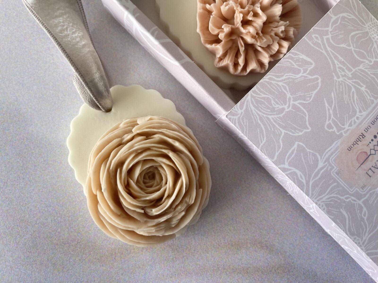Layered petal Honey Peach Ranunculus soap, a one-of-a-kind bathroom sculpture.