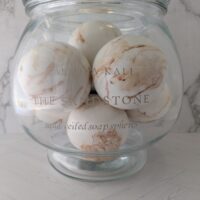 Aged cedarwood and warm mineral scented Sandstone soap spheres by Salsola Kali.