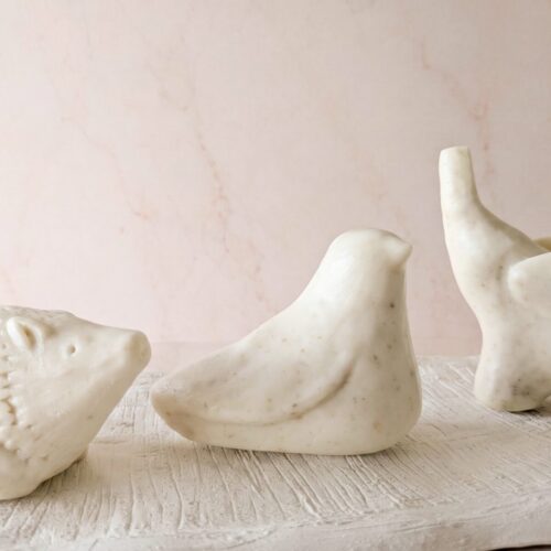 Detailed view of the artisan Animalia collection soaps mimicking fine stone sculptures.