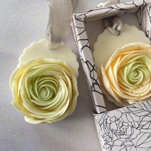 White orchid and neroli scented rose soap on a ribbon, a beautiful Mother's Day gesture.
