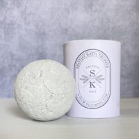 Dark sugar and vanilla Moon Dust bath truffle, a one-of-a-kind self-care offering.