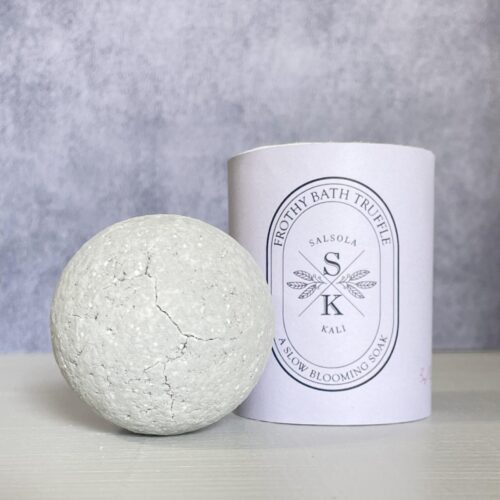 Dark sugar and vanilla Moon Dust bath truffle, a one-of-a-kind self-care offering.