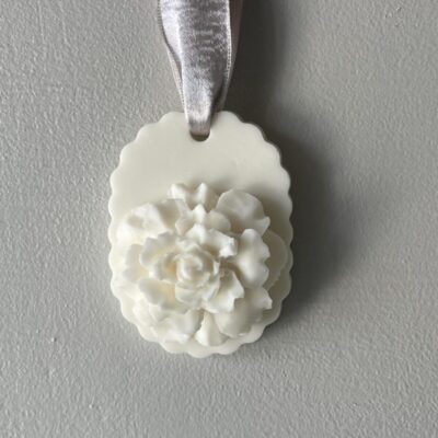 Hanging Ecru Larosa ivory rose soap, a one-of-a-kind holiday gift gesture.