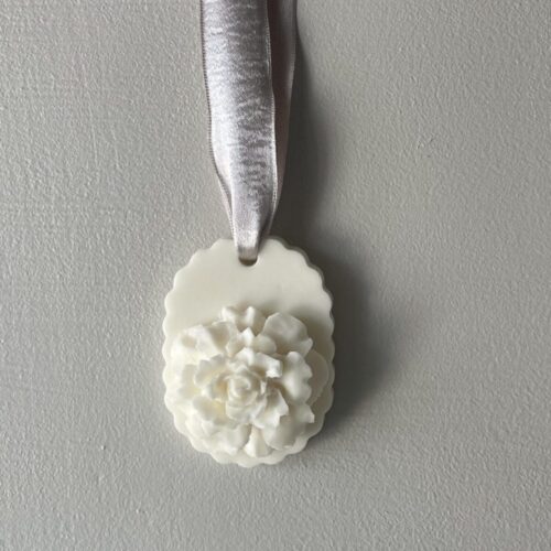Hanging Ecru Larosa ivory rose soap, a one-of-a-kind holiday gift gesture.