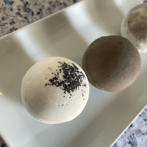 Luxury frothy bath truffle holiday curation, a rare and artisanal self-care presentation.