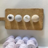 The ultimate "what to get her" gift: a curated set of Salsola Kali frothy bath truffles.