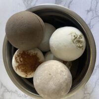 Luxury bath truffle presentation with a creamy whipped center, a rare birthday gift gesture.