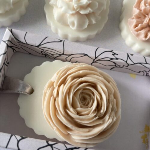 Layered petal Honey Peach Ranunculus soap, a one-of-a-kind bathroom piece.