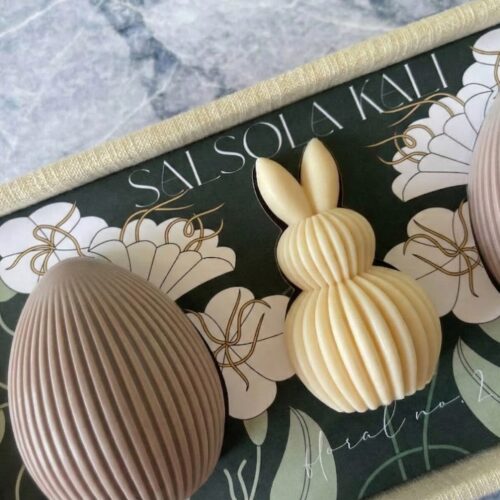 Elegant linen-lined presentation containing Lavender & Lemon Meringue sculptural soaps.