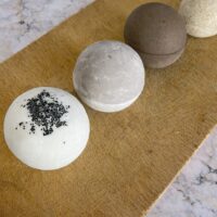 Luxury frothy bath truffle holiday curation, a rare and artisanal self-care presentation.