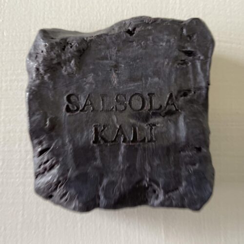 Smooth lathering black Onyx mineral bath bar for refreshed, clean skin.