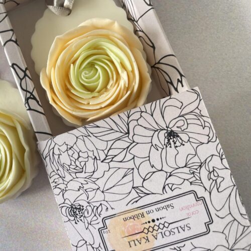 Salsola Kali Pistachio Rose soap on a ribbon with botanical green petals.