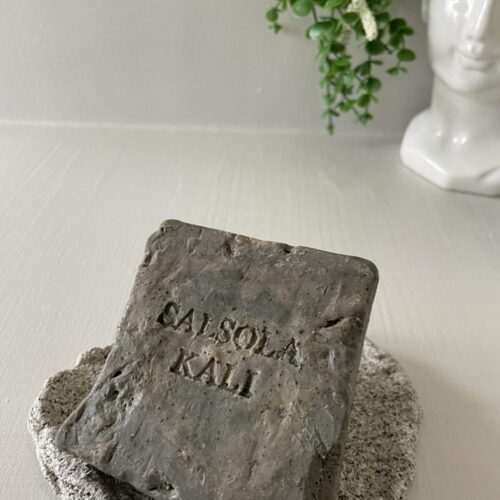Salsola Kali Basalt charcoal volcanic soap with hand-fractured edges.