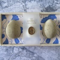 Creamy vanilla and playful cookie-scented soap trio in a linen-lined box.