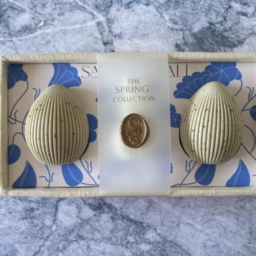 Creamy vanilla and playful cookie-scented soap trio in a linen-lined box.