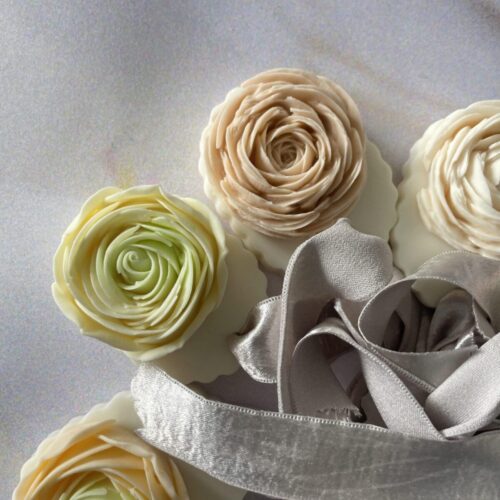 The ultimate 'what to get her' gift: A one-of-a-kind sculpted flower soap on a ribbon.