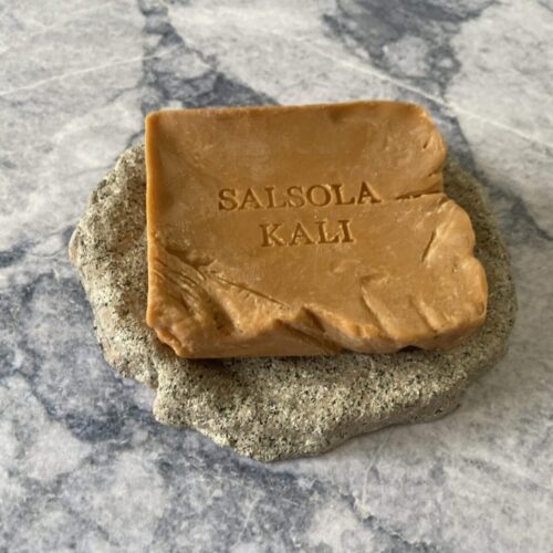 Terracotta mineral soap with a vibrant blood orange and bay leaf fragrance.