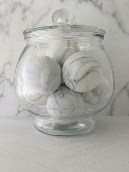Clean bergamot and mineral air scented White Monolith soap spheres.