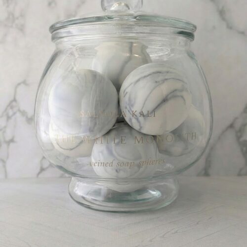 Clean bergamot and mineral air scented White Monolith soap spheres.