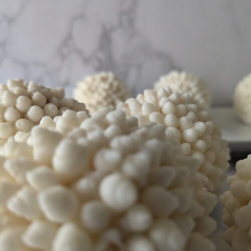 Exquisite coastal cypress and yuzu scented soap spheres, a perfect luxury gift.